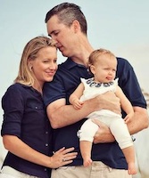 NASCAR VP Ed Bennett with his wife and child / Headline Surfer